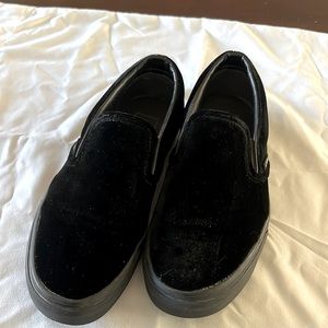 Vans black velvet slip ons
